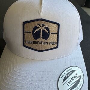 The Classic Tan and Navy Snapback Hat